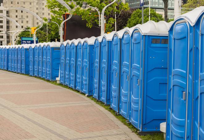 a row of sleek and modern portable restrooms at a special outdoor event in Galena OH